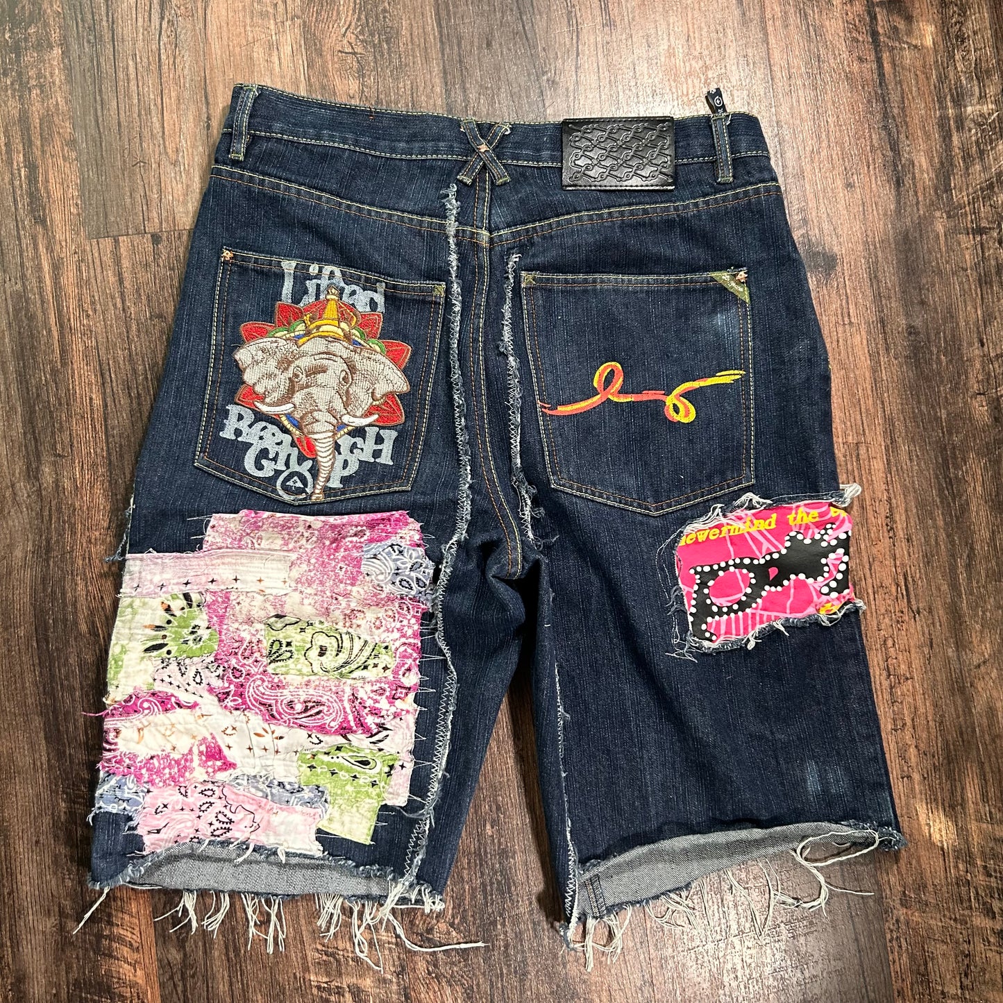 Blue Sp5der patchwork shorts