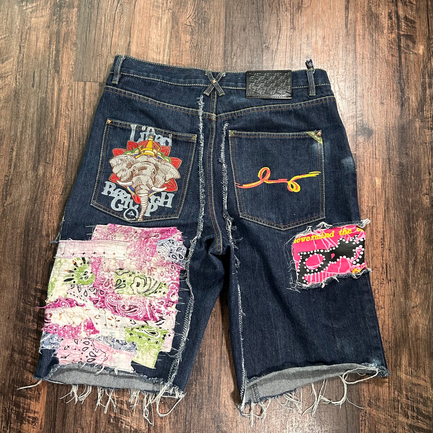 Blue Sp5der patchwork shorts