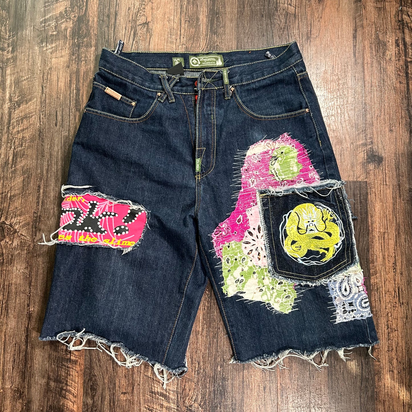 Blue Sp5der patchwork shorts